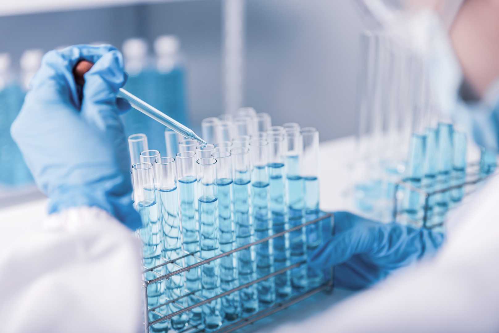 A scientist in a modern laboratory conducting research on antibody-drug conjugates.