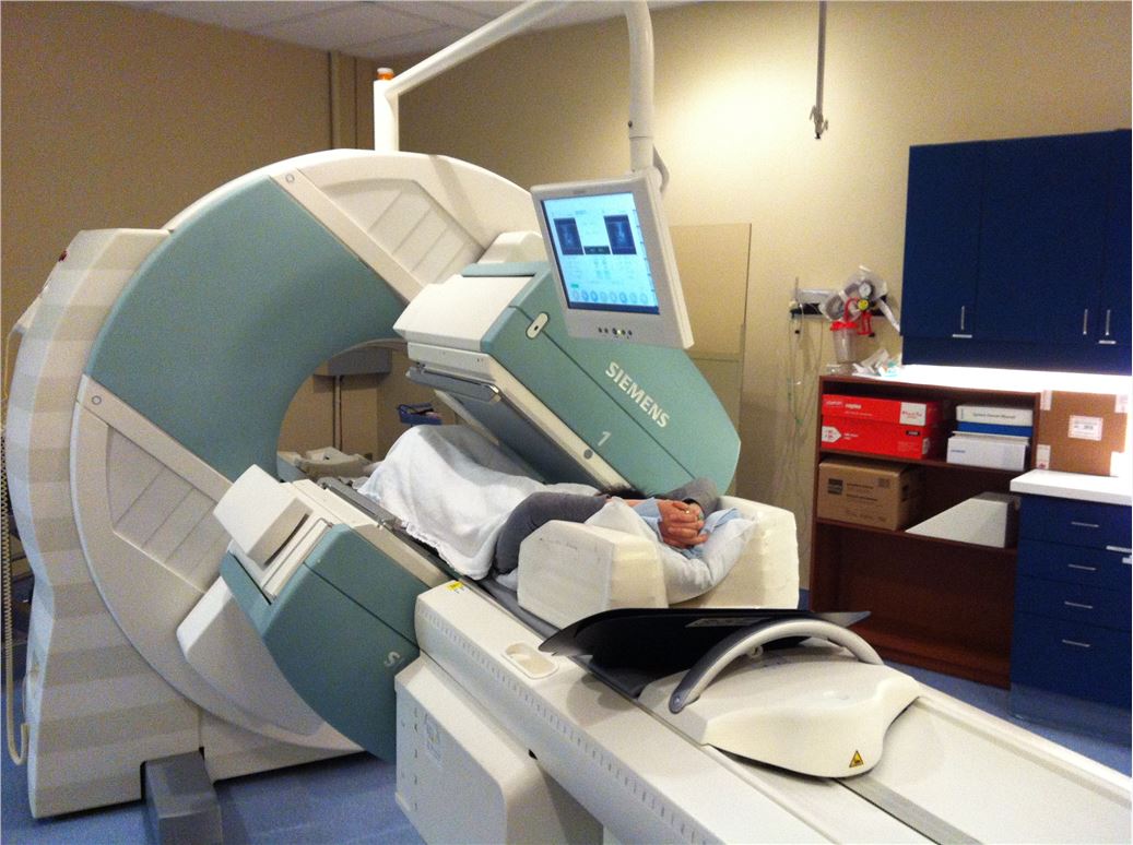 SPECT machine performing a total body bone scan.