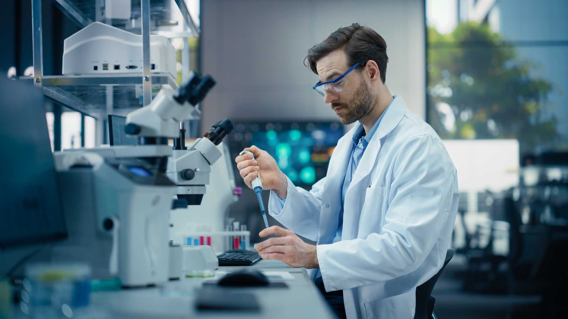 Scientists in a modern laboratory discussing results. Fig.2